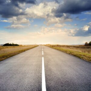 Asphalt Road Under Cloudy Sky