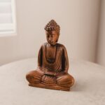 Gautama figurine on table