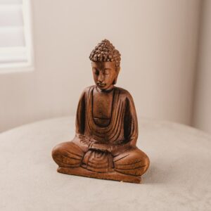 Gautama figurine on table