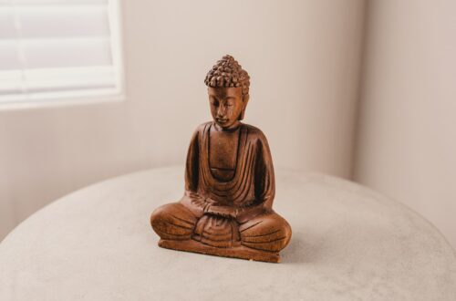 Gautama figurine on table