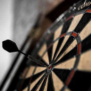 black and brown dart board