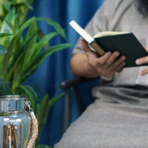 person holding black tablet computer