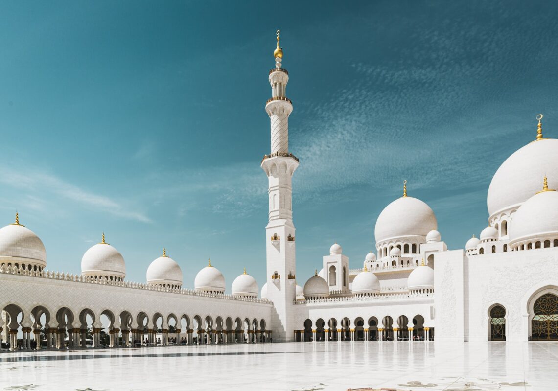 a large white building with Sheikh Zayed Mosque