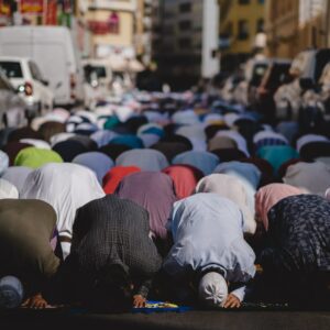 people kneeling and praying during daytime